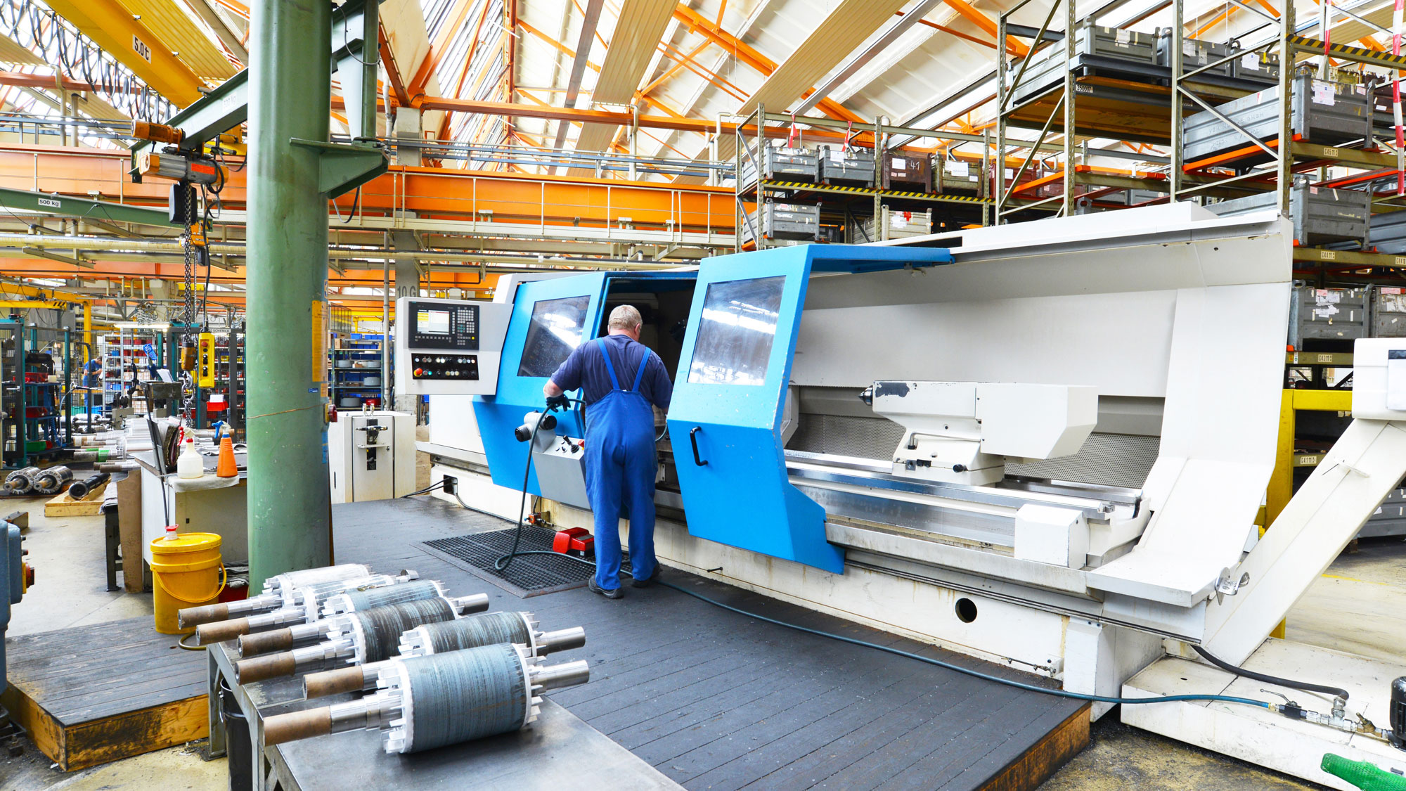 Technician using a wire cutting machine